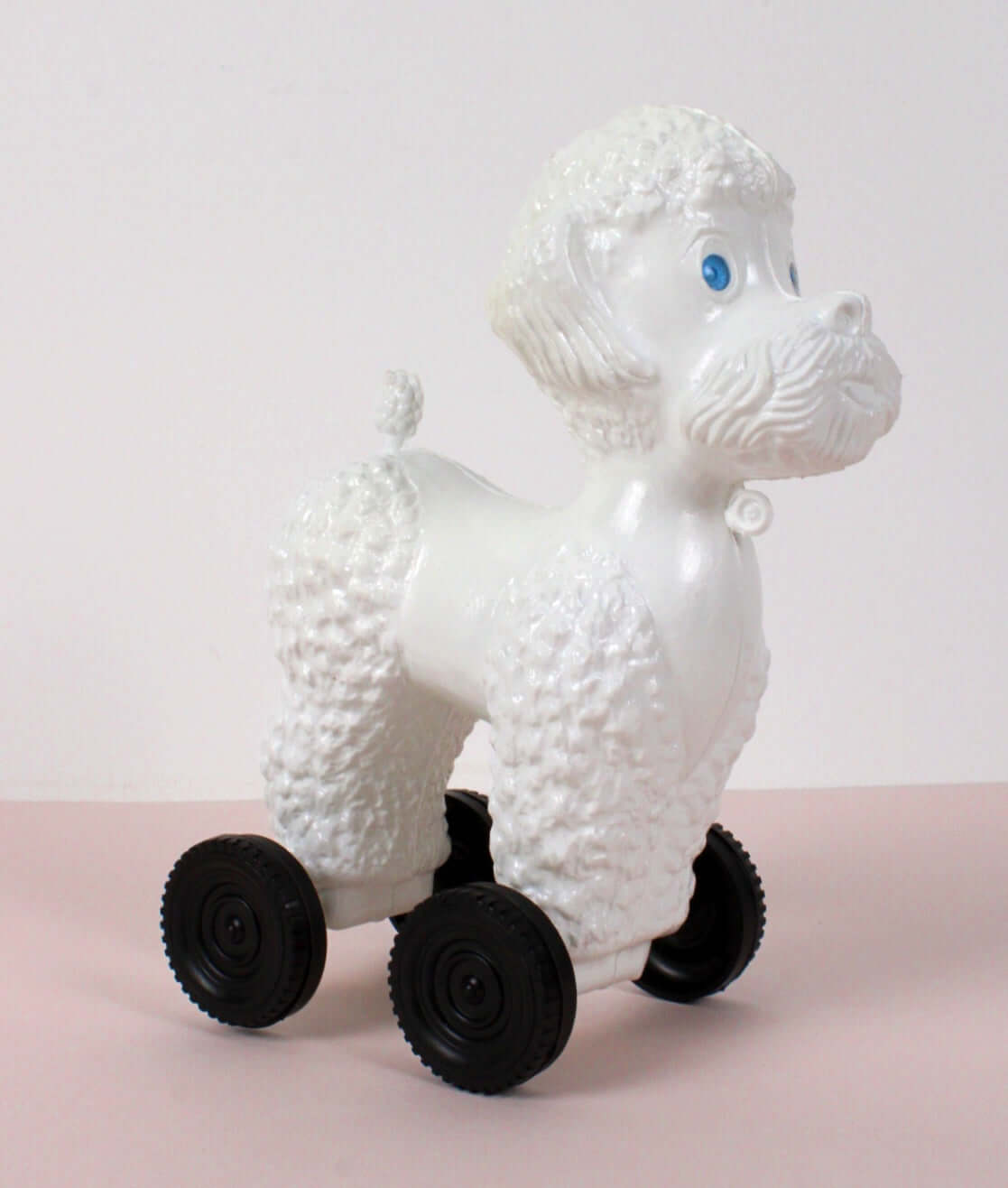 Jouet caniche à roulettes vintage