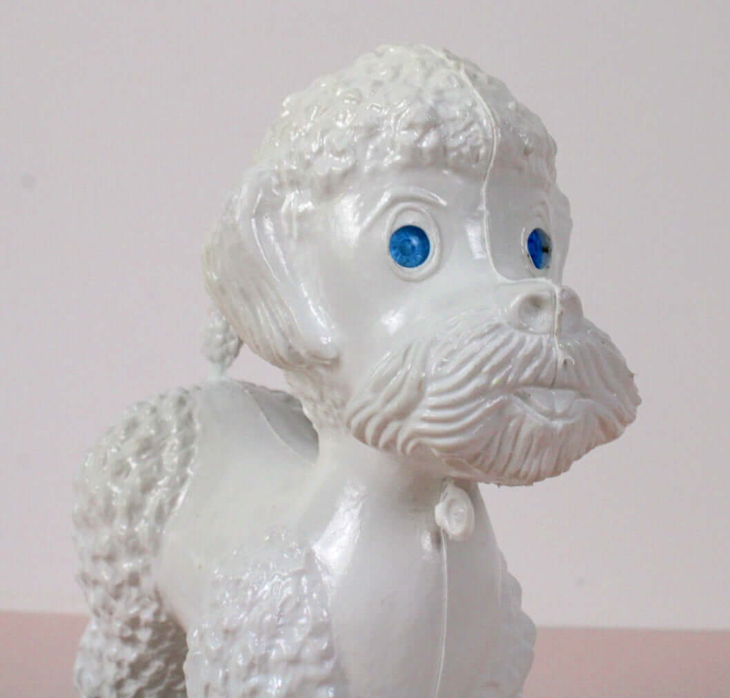 Jouet caniche à roulettes vintage