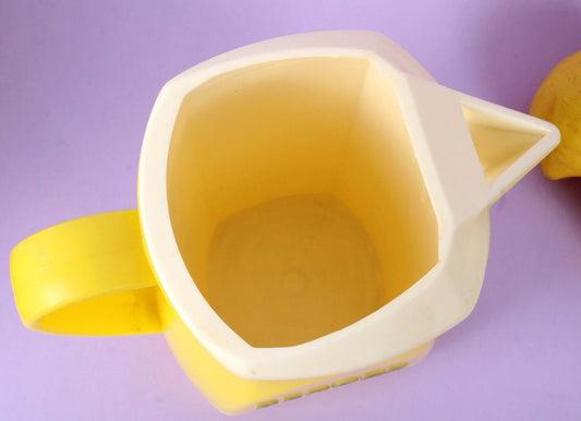 Carafe publicitaire Berger plastique jaune