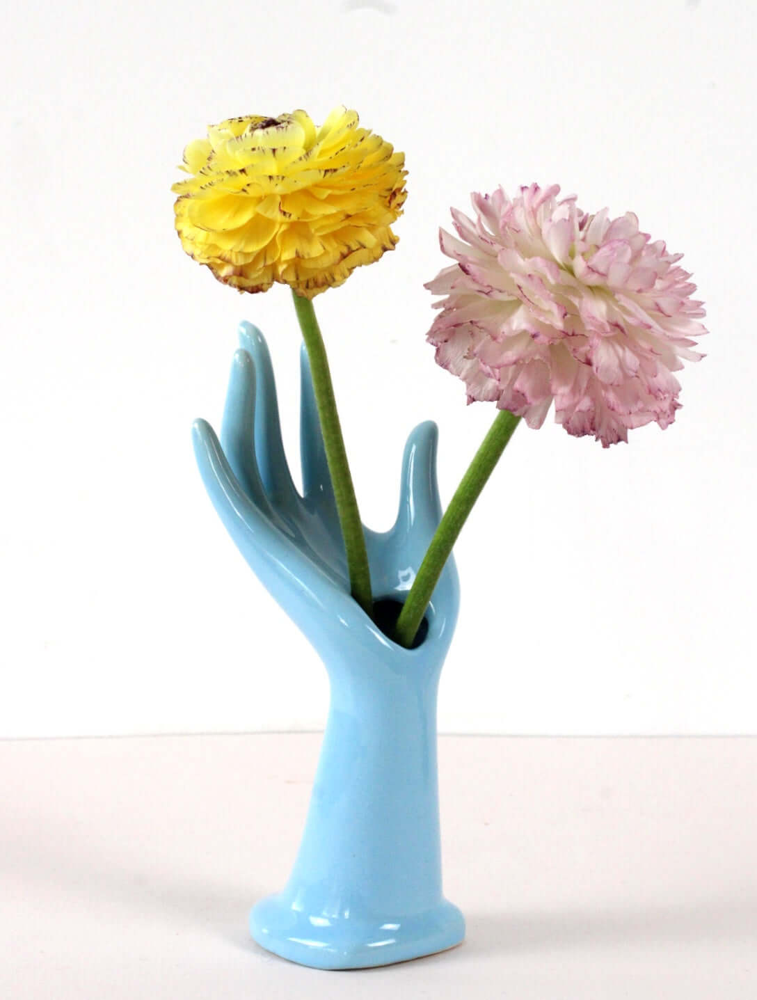 Main baguier soliflore en céramique