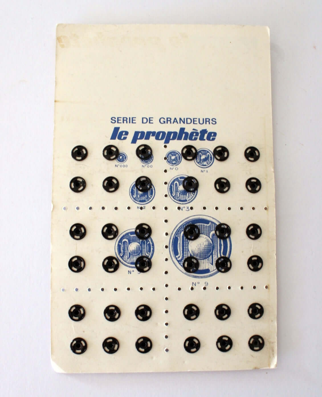 Plaque ancienne de 36 boutons pression vintage