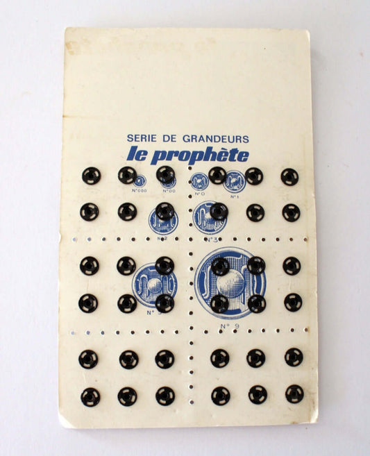 Plaque ancienne de 36 boutons pression vintage