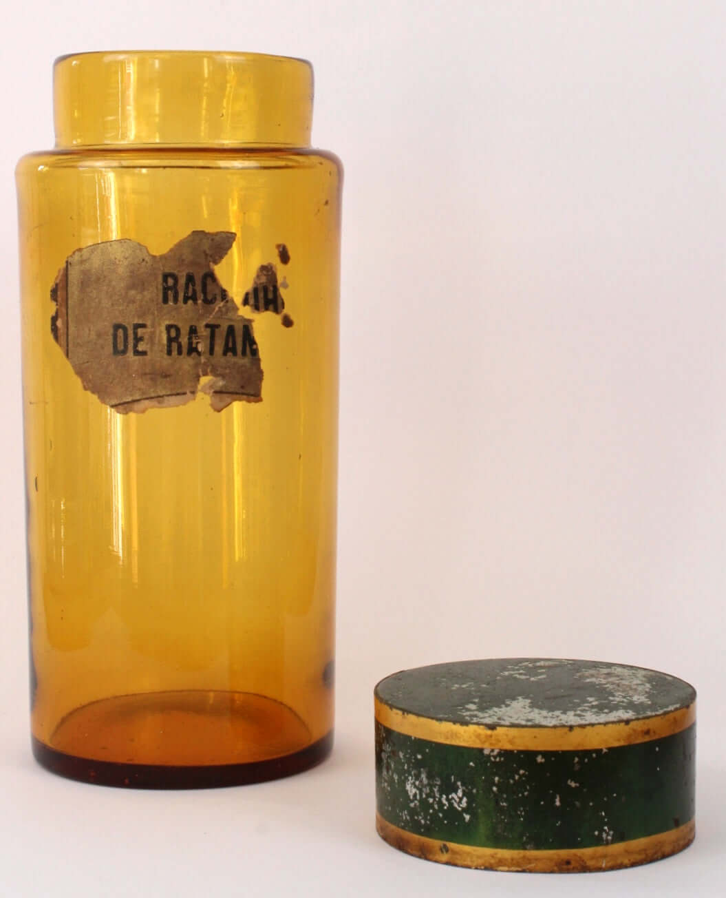 Ancien pot d'apothicaire en verre ambré