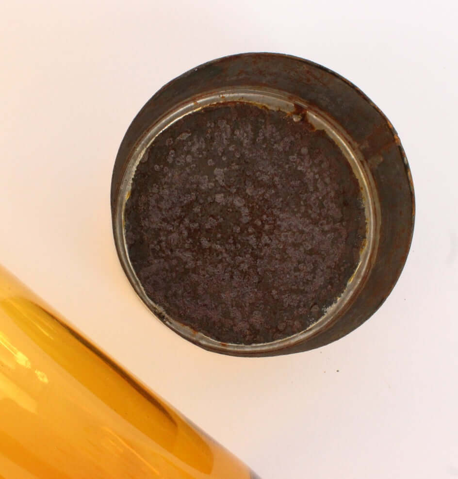 Ancien pot d'apothicaire en verre ambré