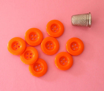 Boutons en plastique orange vintage