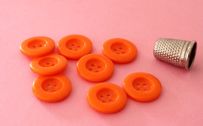 Boutons en plastique orange vintage