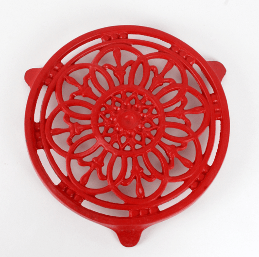 Dessous de plat vintage en fonte rouge